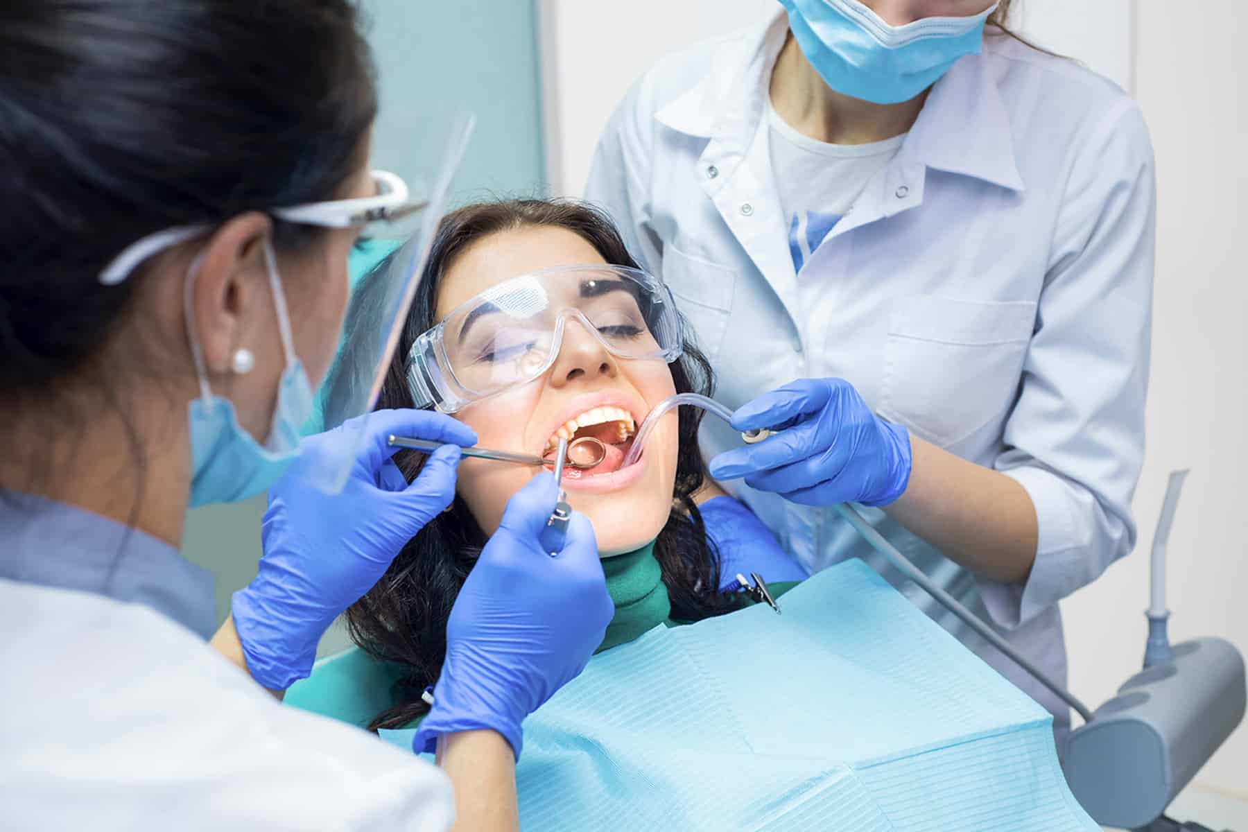 Woman undergoing a dental procedure with sedation dentistry in Charlotte, NC